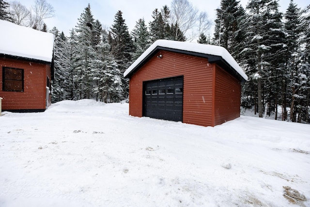 view of snow covered garage