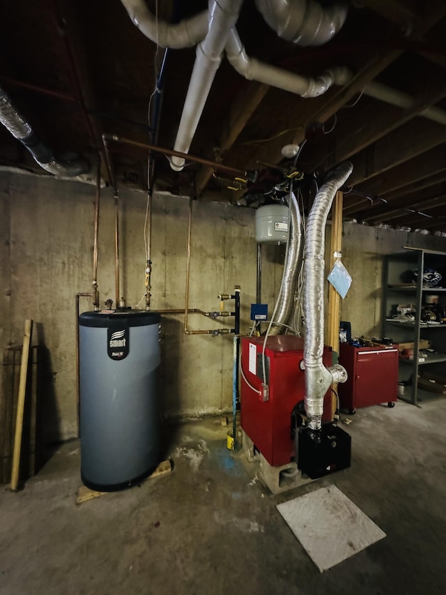 utility room featuring a heating unit and water heater