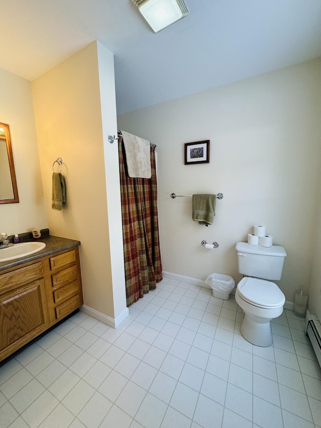 full bathroom with tile patterned floors, baseboards, toilet, and vanity