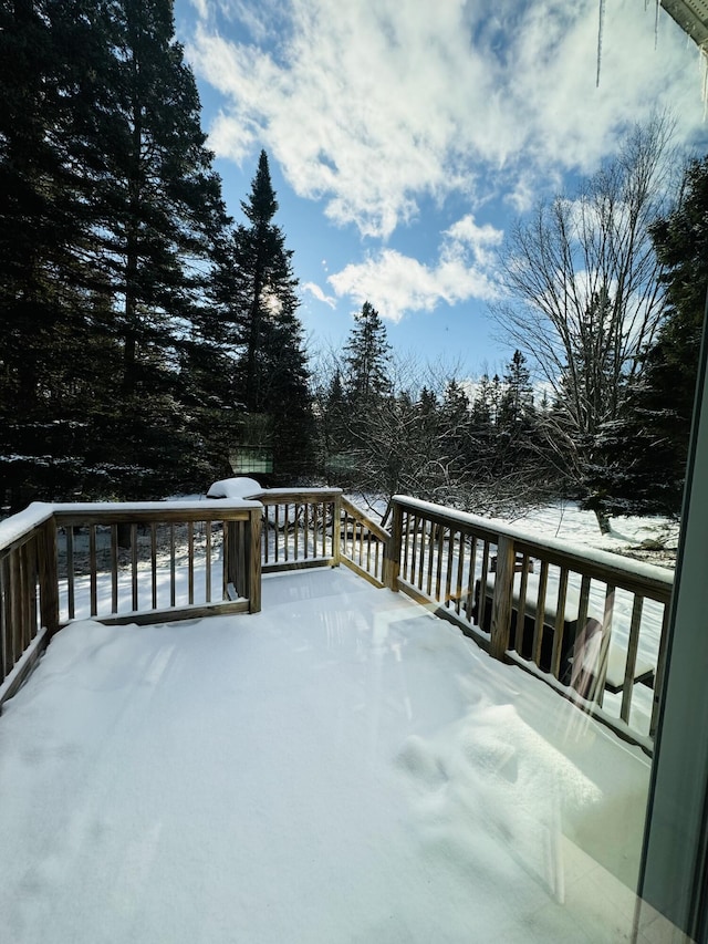 view of snow covered deck