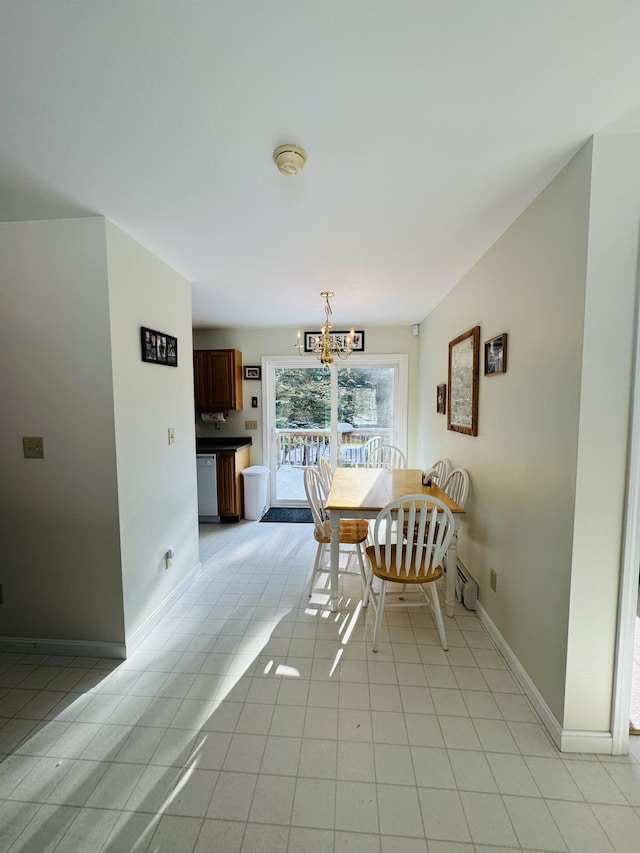 dining room featuring light tile patterned floors and an inviting chandelier