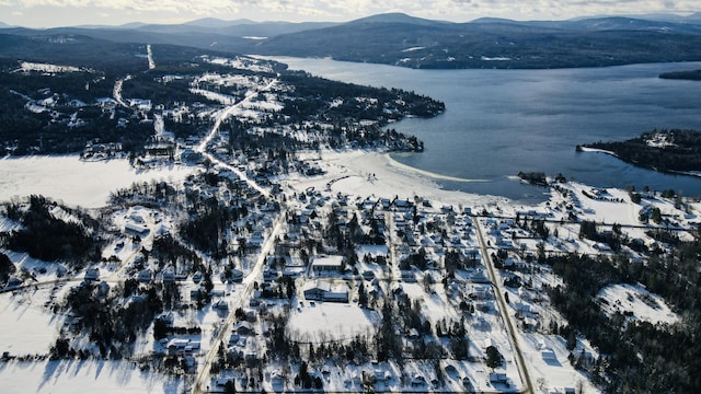 bird's eye view with a water and mountain view