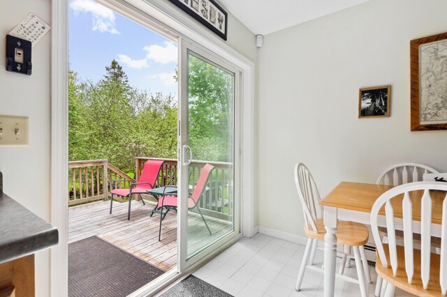 17 Saddleback Vw, Rangeley, ME 04970 - dining room with light tile patterned floors and baseboards