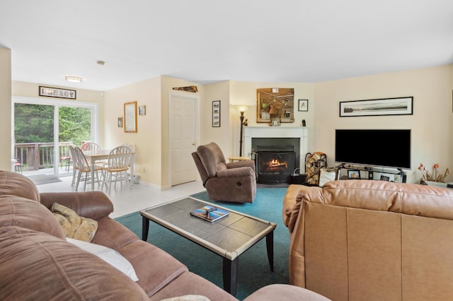 17 Saddleback Vw, Rangeley, ME 04970 - living area featuring baseboards and a fireplace with flush hearth