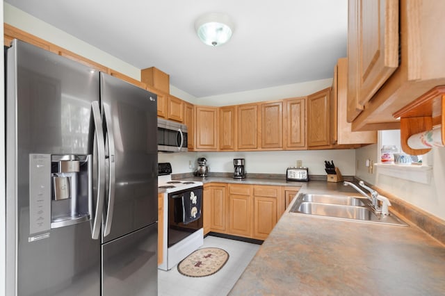 17 Saddleback Vw, Rangeley, ME 04970 - kitchen featuring stainless steel appliances, a sink, and light tile patterned floors
