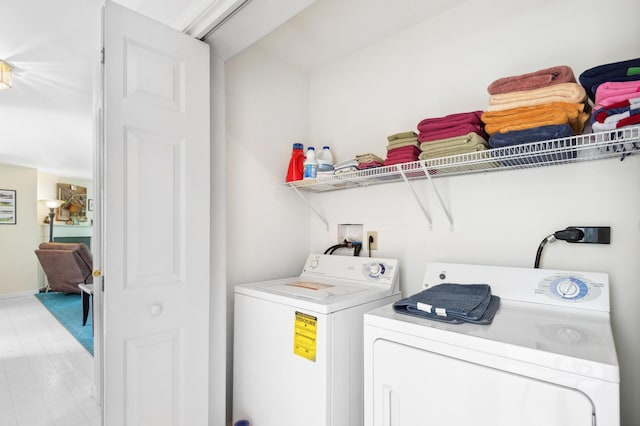 17 Saddleback Vw, Rangeley, ME 04970 - washroom with washing machine and clothes dryer and baseboards