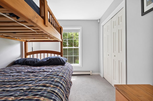 17 Saddleback Vw, Rangeley, ME 04970 - bedroom featuring a baseboard radiator, carpet, and a closet