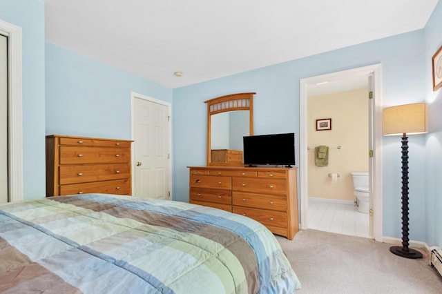 17 Saddleback Vw, Rangeley, ME 04970 - bedroom featuring carpet floors, a baseboard radiator, baseboards, and ensuite bathroom