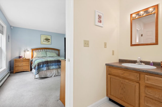 17 Saddleback Vw, Rangeley, ME 04970 - bedroom with a sink, a baseboard radiator, light colored carpet, and baseboards