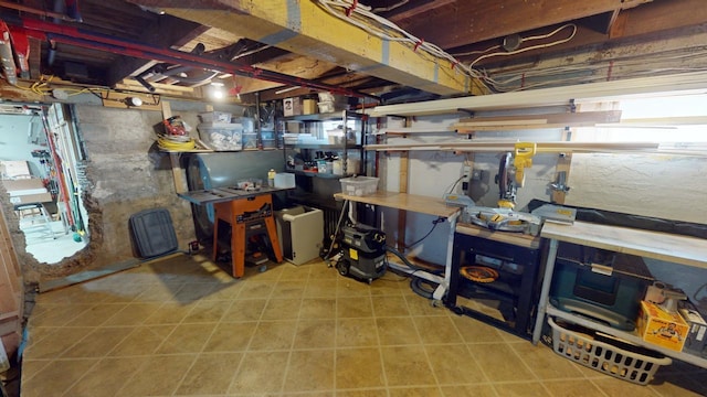 basement featuring a workshop area