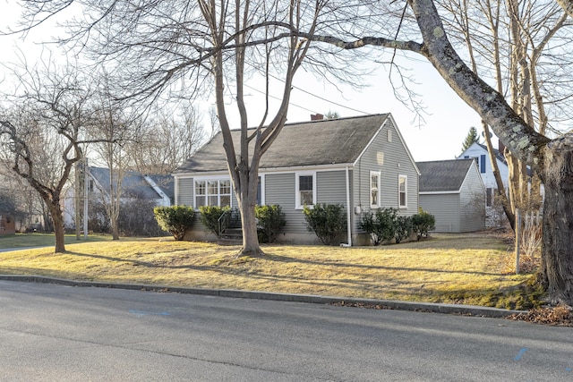 view of front of home featuring a front yard