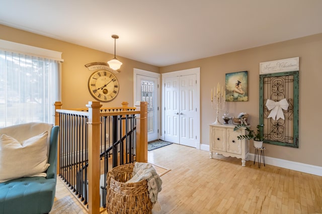 entrance foyer featuring hardwood / wood-style flooring