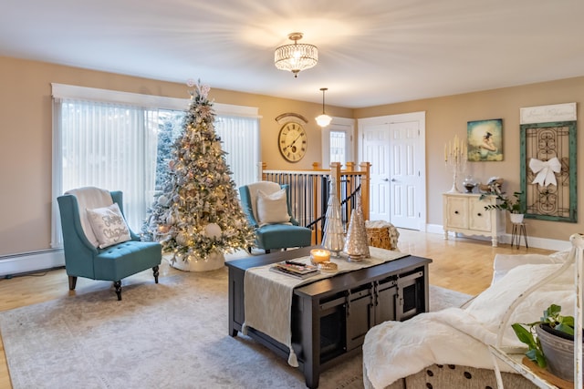 living room featuring a notable chandelier