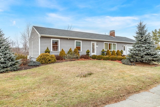 ranch-style house featuring a front yard