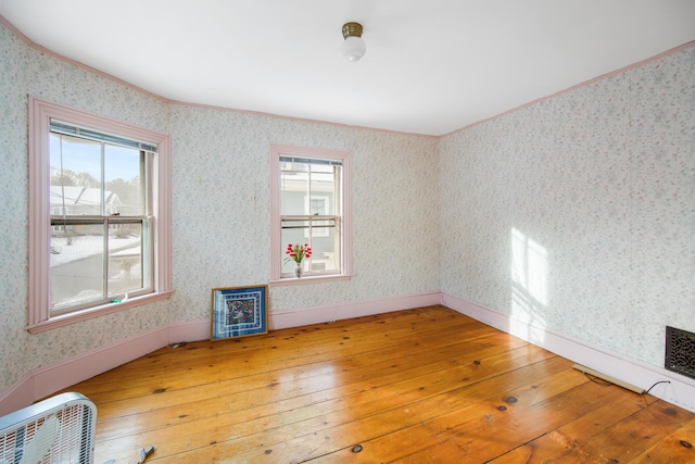 empty room featuring hardwood / wood-style floors