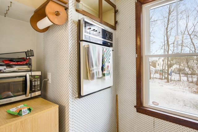 interior space with wall oven