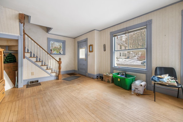 foyer with light wood-type flooring