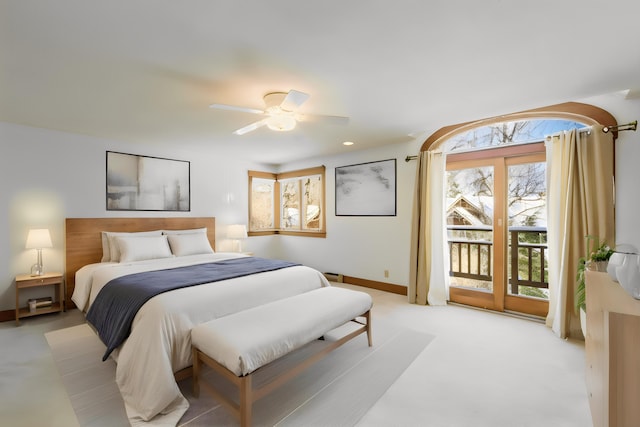 bedroom with ceiling fan and access to exterior