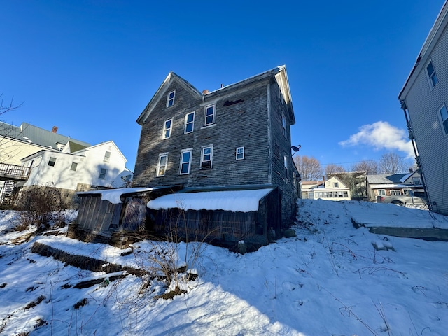 view of snow covered property