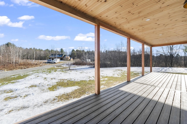 view of snow covered deck