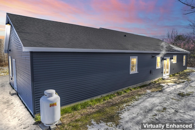 view of property exterior at dusk