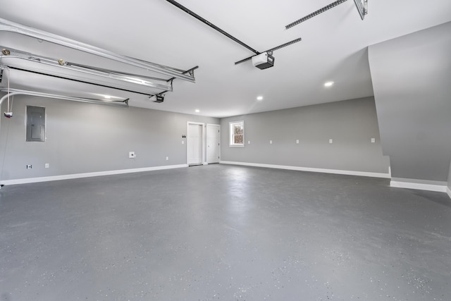 garage with electric panel and a garage door opener