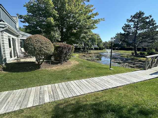 view of yard with a water view