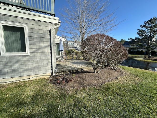 view of yard with a patio area and a balcony