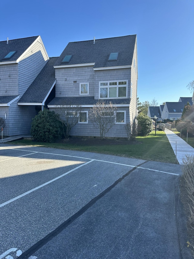 exterior space featuring a front yard