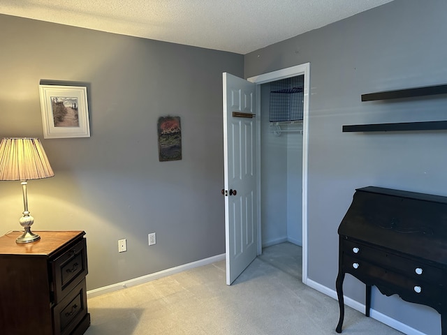 interior space featuring a textured ceiling