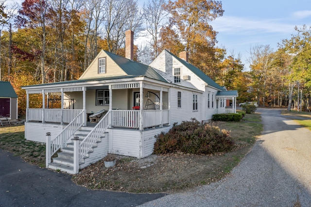 view of front of home featuring covered porch