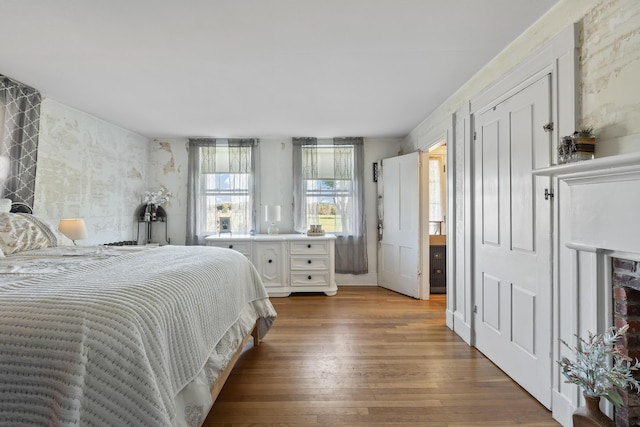 bedroom featuring wood finished floors