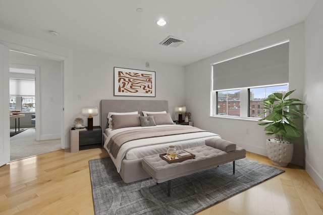 bedroom featuring wood-type flooring