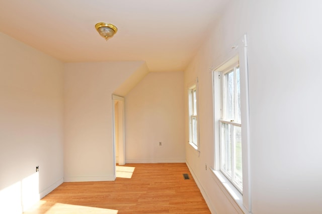 hallway with light wood-type flooring