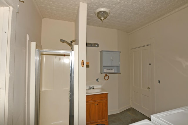 bathroom featuring hardwood / wood-style flooring, vanity, and walk in shower