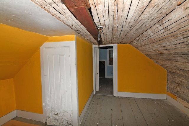 bonus room featuring wood ceiling, vaulted ceiling, and hardwood / wood-style flooring