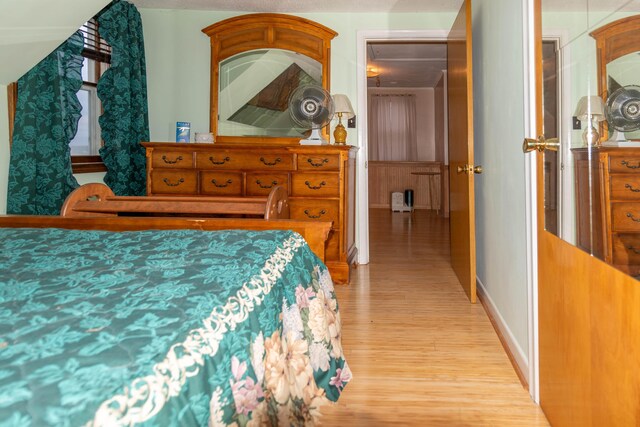 bedroom with light wood-type flooring