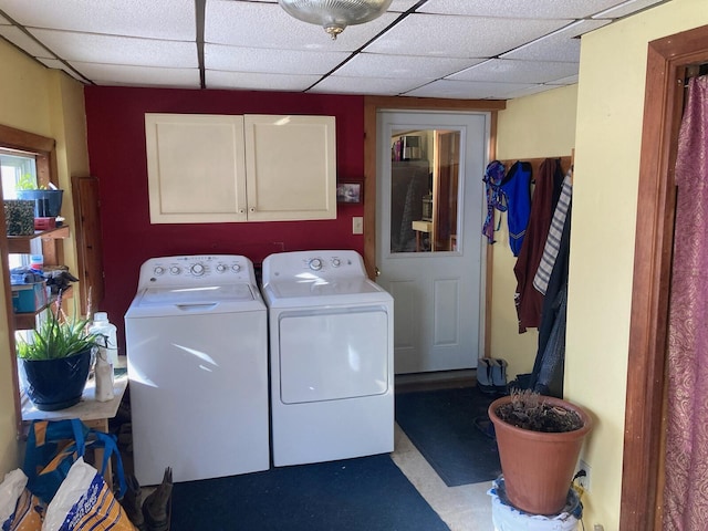 laundry area with cabinets and separate washer and dryer