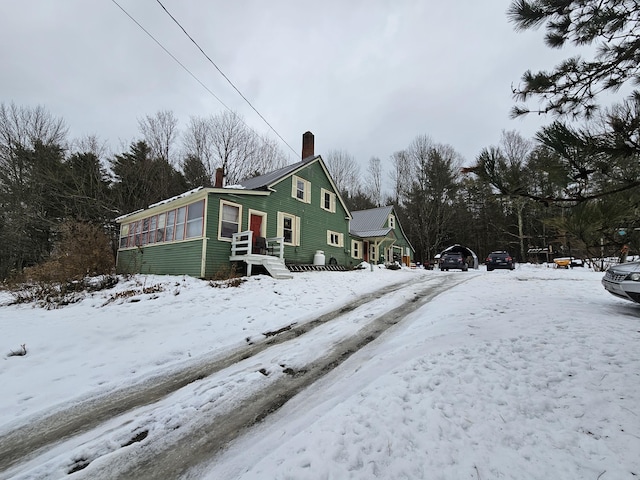 view of snow covered property