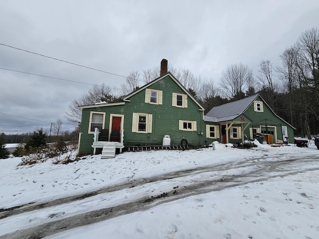 view of snow covered property