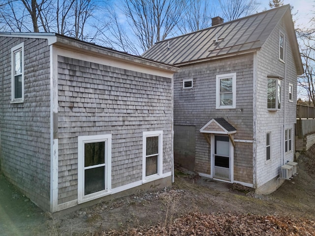 view of property exterior featuring central AC