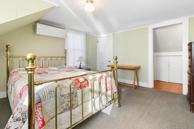 carpeted bedroom with a wall mounted air conditioner and vaulted ceiling