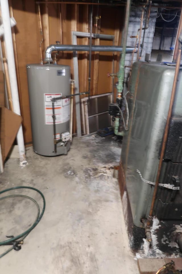 utility room with water heater