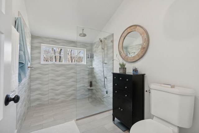 6 Brooks St, Kennebunkport, ME 04046 - full bath featuring a walk in shower, vanity, and vaulted ceiling