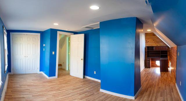 1 Branch St, Camden, ME 04843 - unfurnished bedroom featuring wood finished floors, recessed lighting, and a closet
