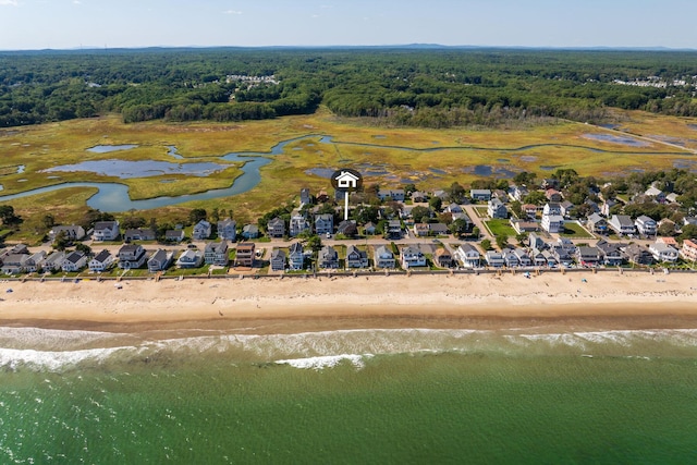 bird's eye view featuring a beach view and a water view