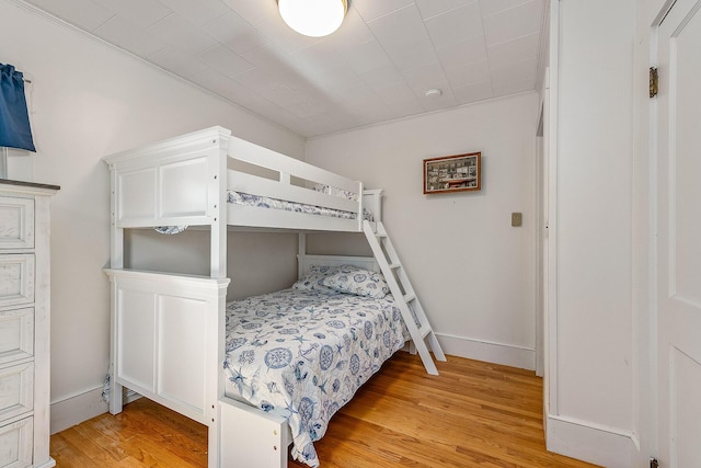 bedroom with light hardwood / wood-style floors