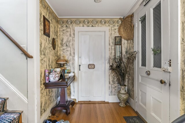 9 Dry Point Dr, Rome, ME 04963 - entryway featuring light hardwood / wood-style floors and crown molding