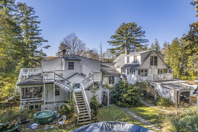 9 Dry Point Dr, Rome, ME 04963 - view of front of property featuring a wooden deck