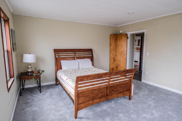 carpeted bedroom featuring crown molding